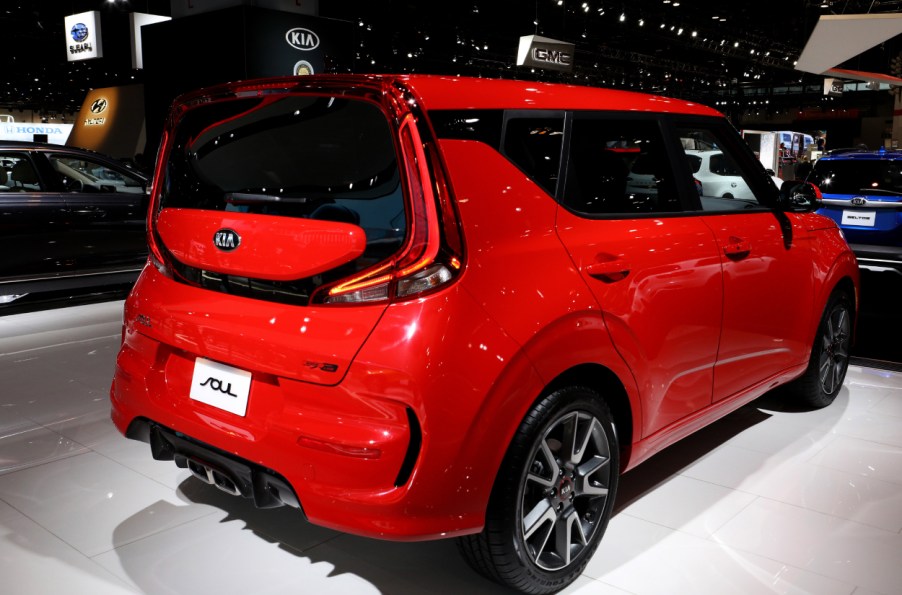 A red Kia Soul on display at an auto show