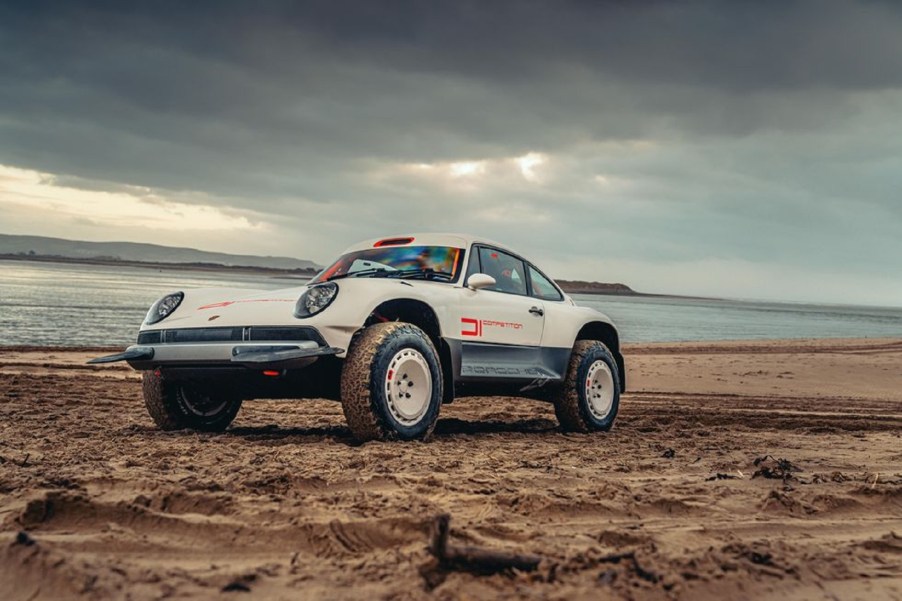 The white Singer ACS on a beach