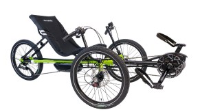 A bright-green TerraTrike Rambler EVO recumbent e-trike