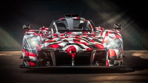 An image of a Toyota GR Super Sport parked in a warehouse.