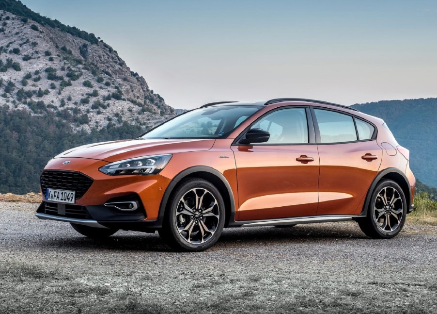 An orange 2019 Ford Focus Active wagon on a mountain road