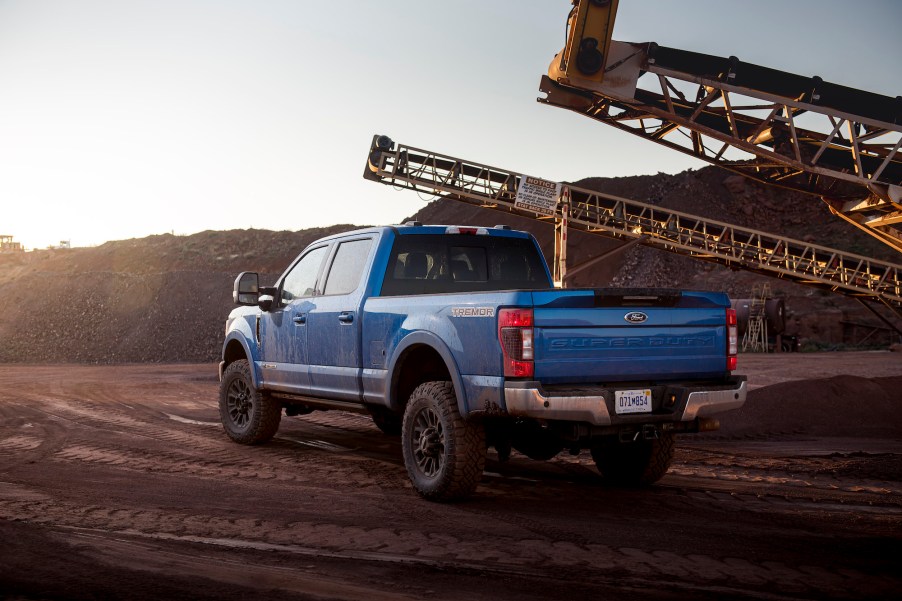 A Lightning Blue 2020 Ford F-350 Tremor XLT Super Duty pickup truck on a construction site