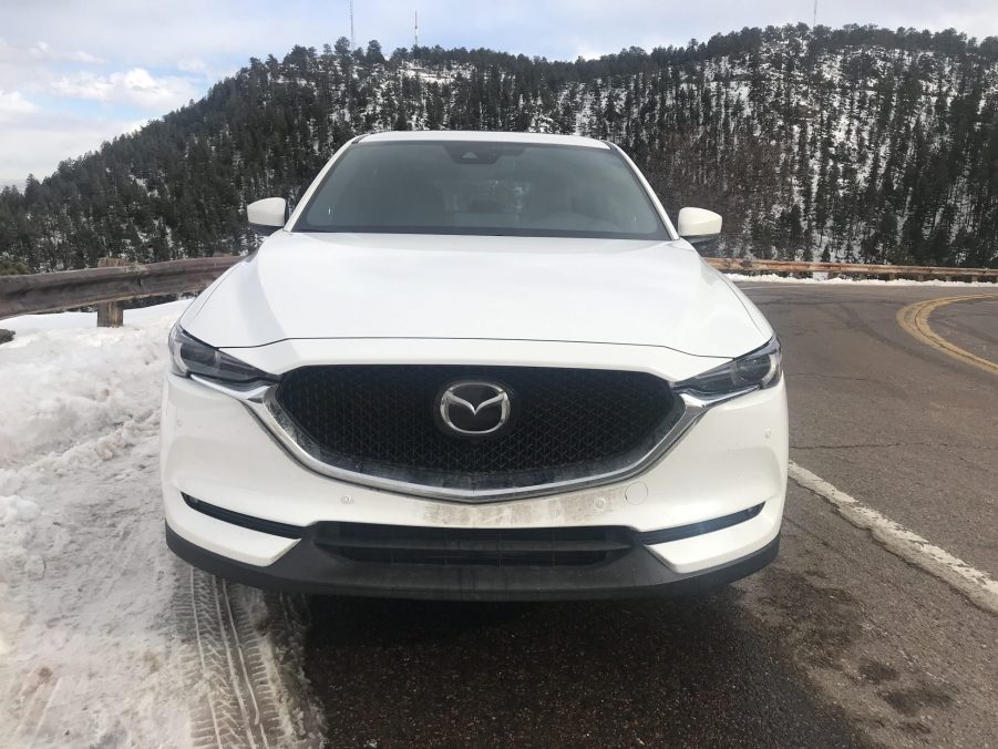 front shot of the 2021 Mazda CX-5 on a mountain road