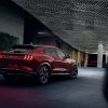 The rear 3/4 view of a red 2021 Ford Mustang Mach-E Premium