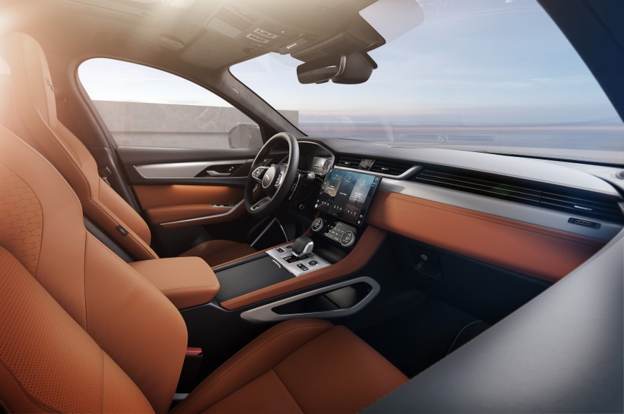 A2021 Jaguar F-Pace luxury compact SUV's tan cockpit