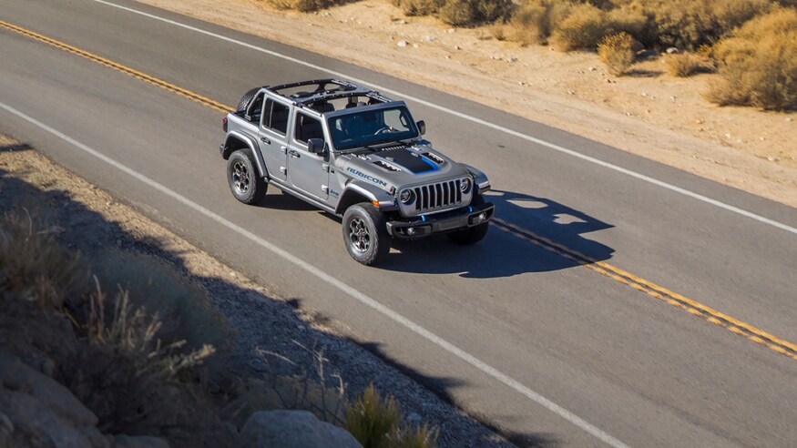 2021 Jeep Wrangler 4xe driving on road 