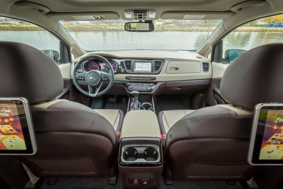 Beige leather interior of a 2021 Kia Sedona minivan