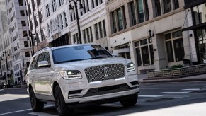 2021 Lincoln Navigator driving down a city street