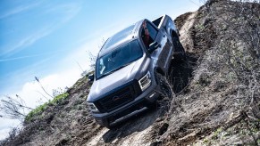 A 2021 Nissan Titan navigates a steep hill