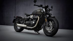 A matte-gray-and-brown 2021 Triumph Bonneville Bobber