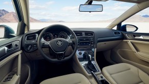 Beige cockpit in a 2021 Volkswagen Golf four-door hatchback