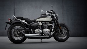 The side 3/4 view of a black-and-white 2022 Triumph Bonneville Speedmaster