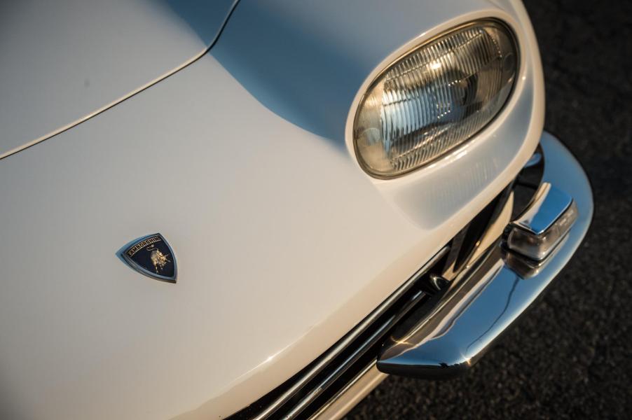 An image of a Lamborghini 350GT driving around on a track.