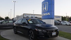 Honda logo and Honda Accord vehicle are seen at a store in San Jose, California on August 27, 2019