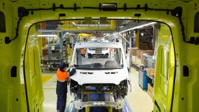 A worker assembles a Ford Transit van