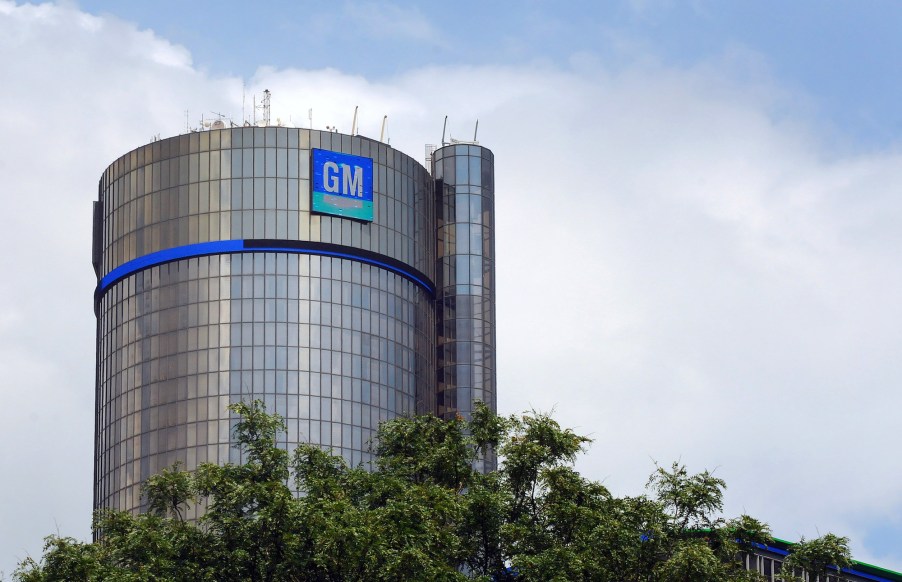 A blue and gray GM logo on General Motors' world headquarters in Detroit