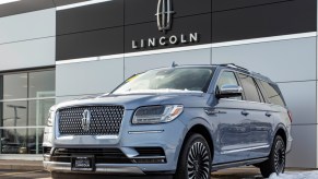 A Lincoln Navigator on display at a car dealership