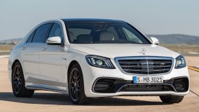 An image of a white Mercedes-Benz S63 AMG parked outdoors.