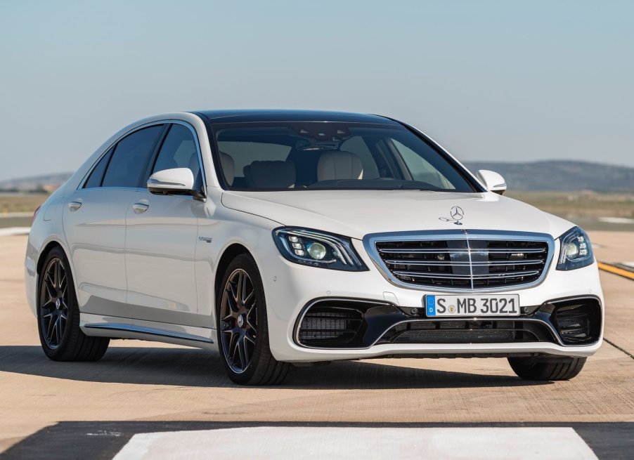 An image of a white Mercedes-Benz S63 AMG parked outdoors.