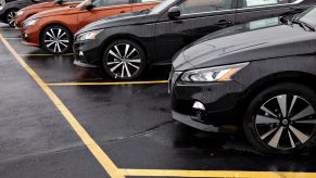 Nissan Altimas on display at a dealership