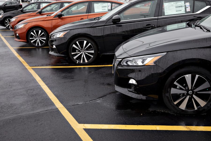 Nissan Altimas on display at a dealership