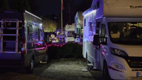 A row of campers parked at an RV park