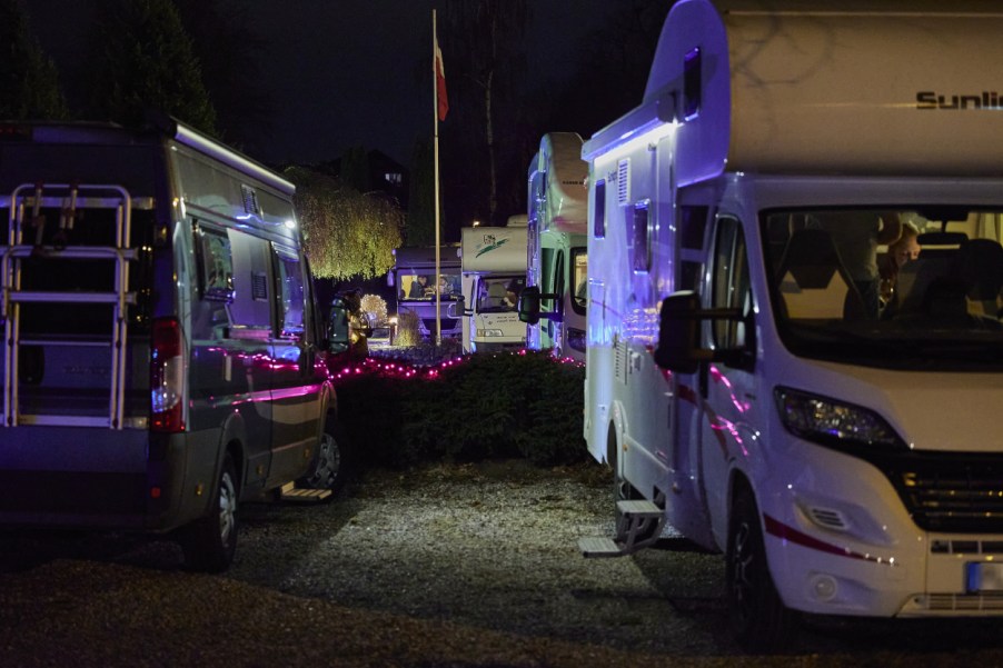 A row of campers parked at an RV park