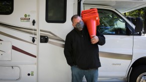 RV instructor Freddie Heller teaches Washington Post travel writer Andrea Sachs about her rented RV Saturday, September 19, 2020, at a KOA campground in Fredericksburg, Virginia.