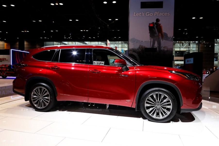 A Toyota Highlander Hybrid on display at an auto show