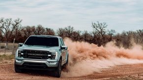 The 2021 Ford F-250 Roush kicking up sand