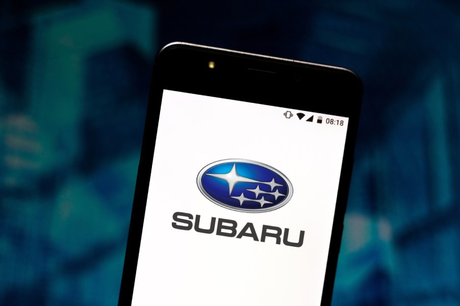 A Subaru logo displayed on a cell phone screen