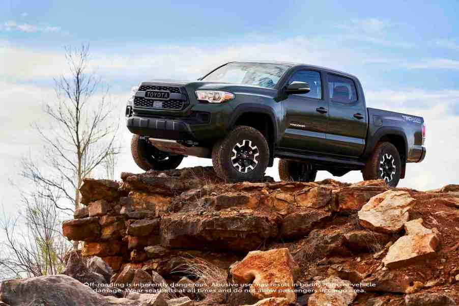 An image of a 2021 Toyota Tacoma outside off-roading.