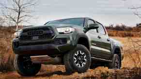 An image of a 2021 Toyota Tacoma outside off-roading.