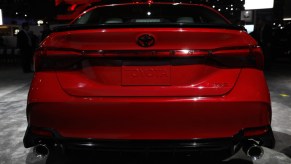 A back of a Toyota Avalon on display at an auto show