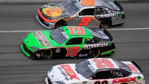 Harrison Burton, Joe Gibbs Racing, Toyota Supra (20); Brandon Jones, Joe Gibbs Racing, Toyota Supra Toyota (19); and Noah Gragson, JR Motorsports, Chevrolet Camaro (9) during the 39th-annual NASCAR Racing Experience 300 on February 15, 2020, at Daytona International Speedway in Daytona Beach, Florida