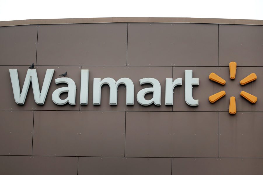 A Walmart sign hangs outside of a Walmart store in Chicago, Illinois.