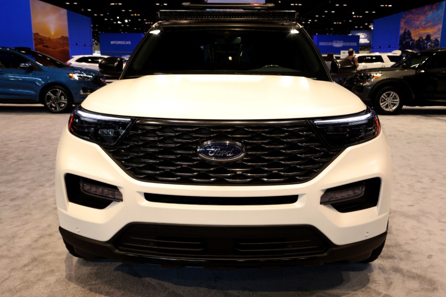 The front grille of a Ford Explorer on display at an auto show