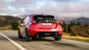 An image of a red Toyota GR Yaris out on the road.