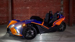 An image of a 2021 Polaris Slingshot parked inside.