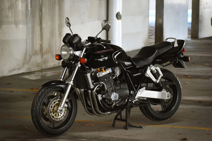 A black 1994 Honda CB1000 Super Four in a parking garage