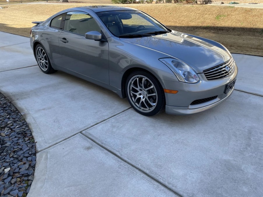 A metallic-gray 2005 Infiniti G35 Coupe parked on a driveway