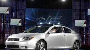 A silver 2005 Scion tC on display