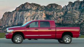 A red 2008 Dodge Ram diesel pickup with a manual transmission