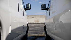 2019 Chevrolet Express work vans are displayed at a car dealership in Tinley Park, Illinois, U.S., on Monday, Sept. 30, 2019