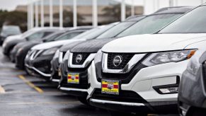 A 2019 Nissan Motor Co. Rogue sport utility vehicle (SUV) sits on the lot at a car dealership in Joliet, Illinois