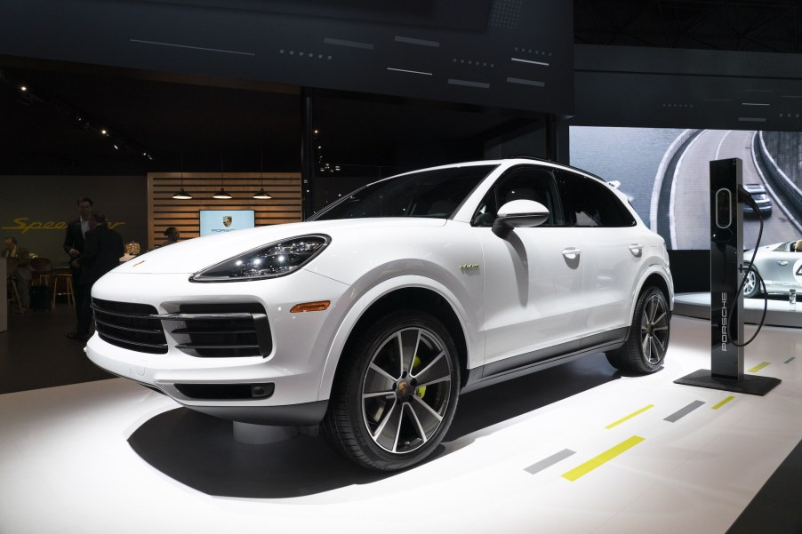 A white 2019 Porsche Cayenne E-Hybrid luxury SUV on display at the 2019 New York International Auto Show on Thursday, April 18, 2019