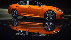 An orange 2020 Nissan Sentra sits on display