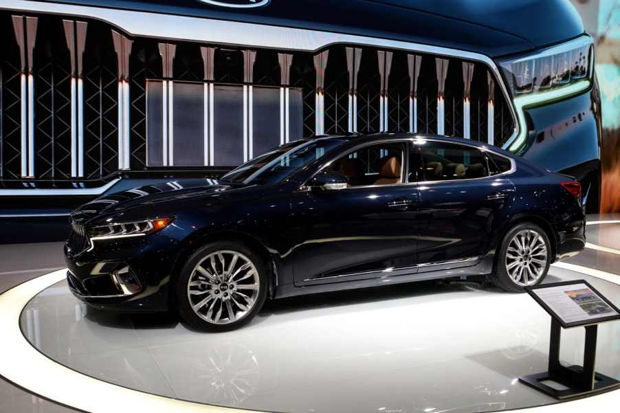 A 2020 Kia Cadenza sits on display at an auto show