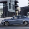 A grey 2021 BMW 2 Series Gran Coupe driving on a city street