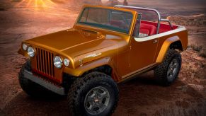 The orange 2021 Jeep Jeepster Beach concept in the desert mountains